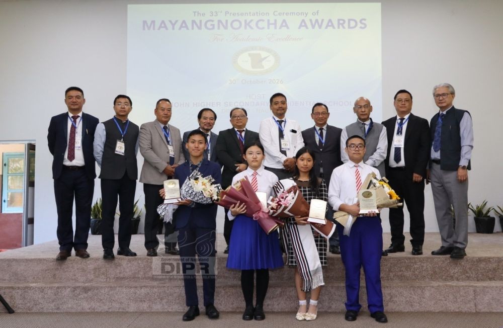 Trustees of the Mayangnokcha Award Trust along with student award recipients at St John Higher Secondary Residential School, Dimapur on October 30. (DIPR Photo)